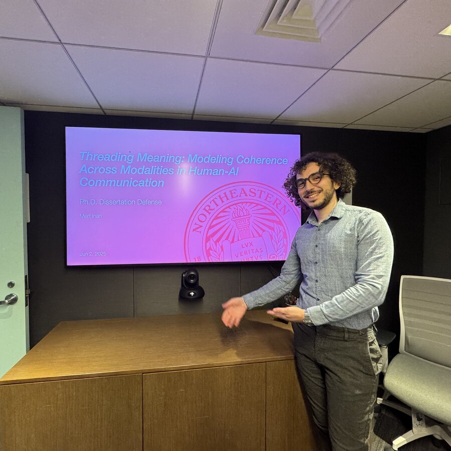 Mert İnan presenting a lecture